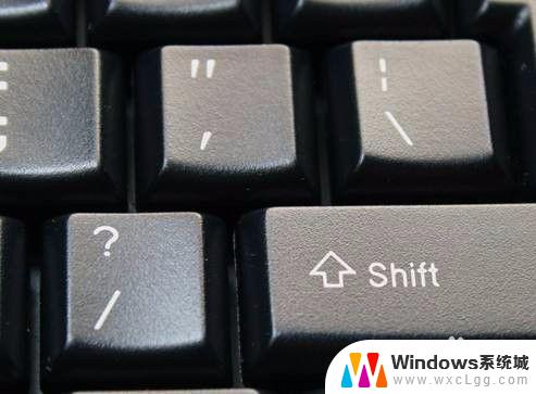 电脑键盘怎么打出括号 电脑键盘上如何打出括号